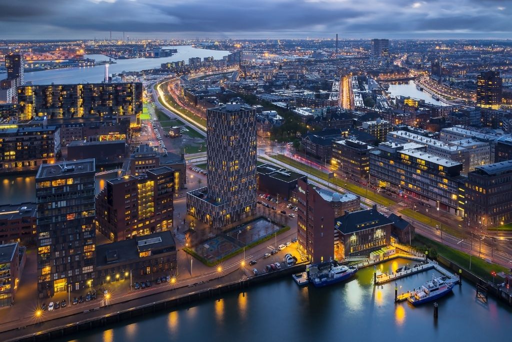 Stack of blueberry pancakes with powdered sugar and syrup. A delicious brunch option!